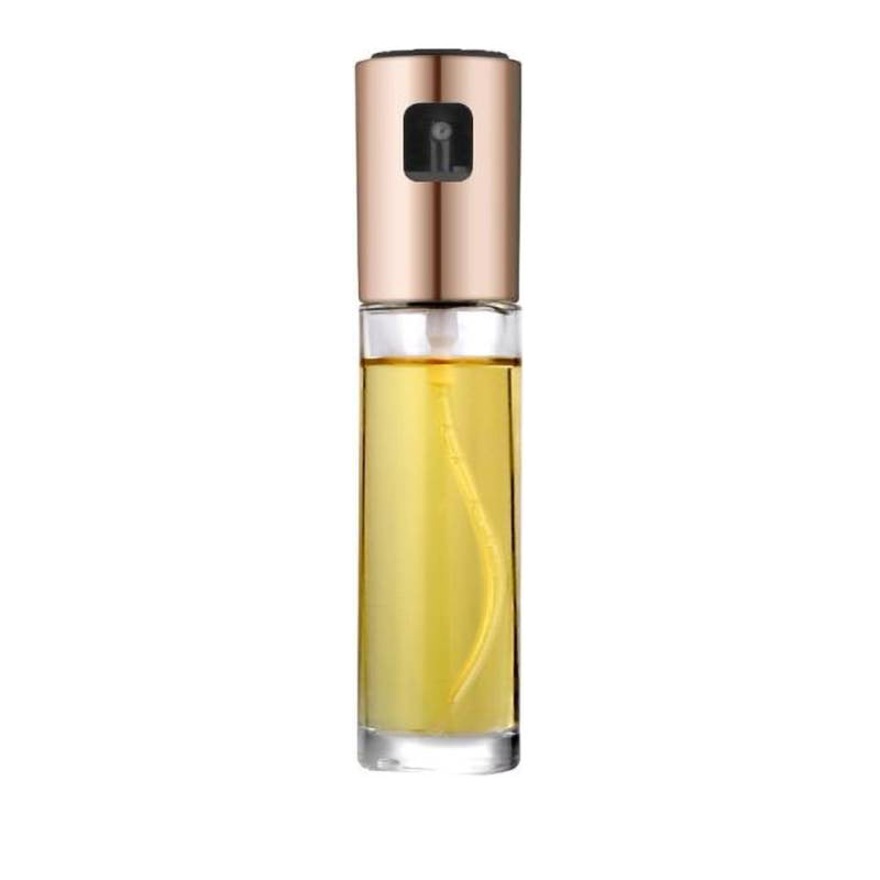 Clear bottle with gold cap on a white background