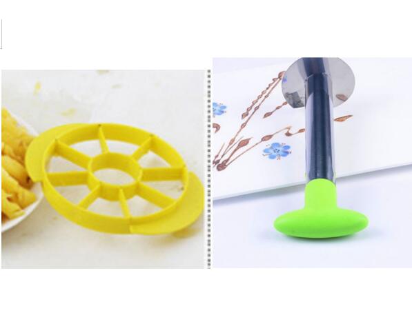 Yellow circular kitchen tool and green kitchen tool on a white background