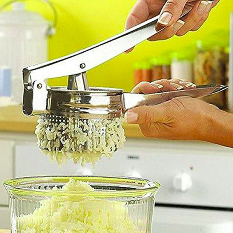 person holding silver fruit juicer 