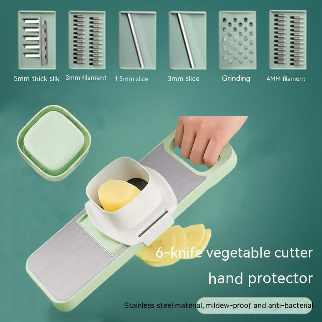 6-knife vegetable cutter with hand protector on a green background