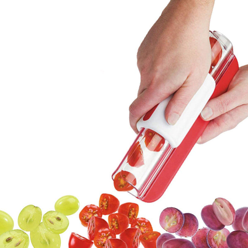 Hand using a red and white fruit and vegetable peeler with sliced fruits and vegetables on a white background