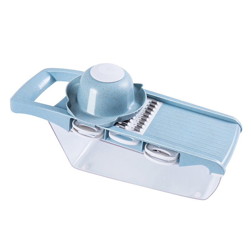 Blue kitchen slicer on a white background