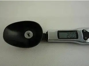 Digital car jack with a black handle on a white background