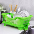 green dish rack on table