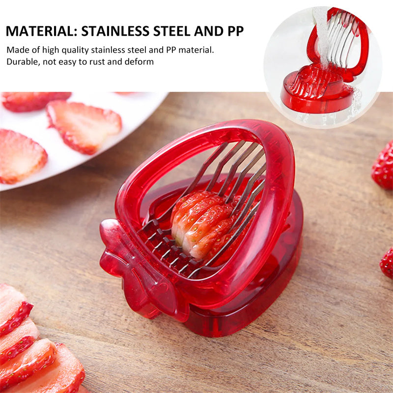 Red strawberry huller on a wooden surface with sliced strawberries and a plate in the background.