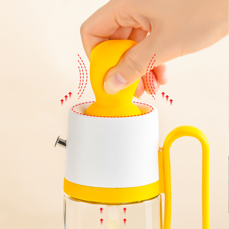 Hand using a yellow juicer on a beige background