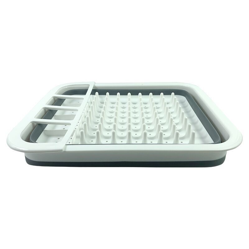 White and gray plastic tray with grid design on a white background