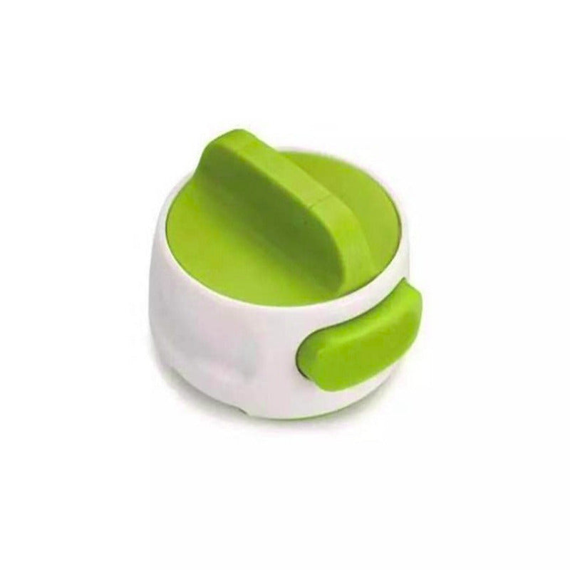 Green and white kitchen tool on a white background