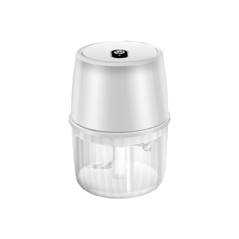 White handheld food chopper on a white background