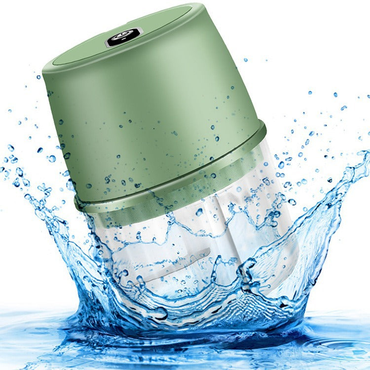 Green water bottle with water splashing around it on a white background